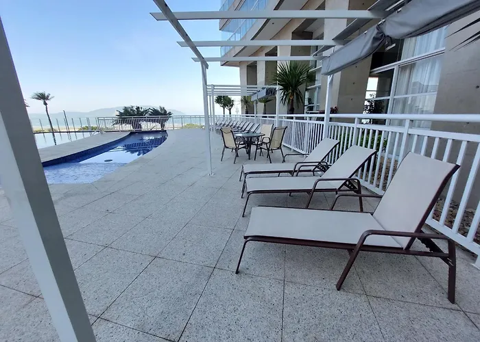 Book Santos Unlimited 817 Elegancia Vista Mar